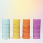 Load image into Gallery viewer, Front view of blue yellow orange purple Noz sunscreen best sunblock for body and face
